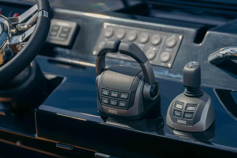 Delilah Yacht Photos Pics Control panel of 2024 Pardo Yachts 43, featuring modern steering and joystick controls.