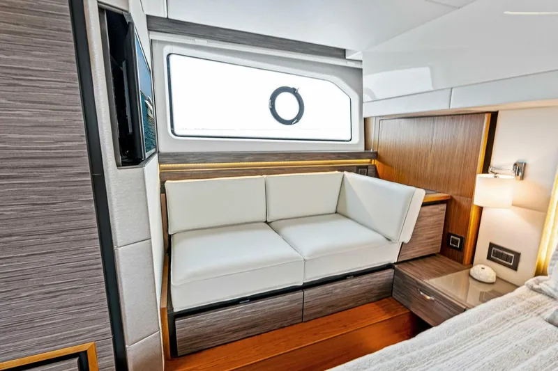 Victory Yacht Photos Pics Interior of 2019 Tiara Yachts 49 COUPE with modern seating and window.