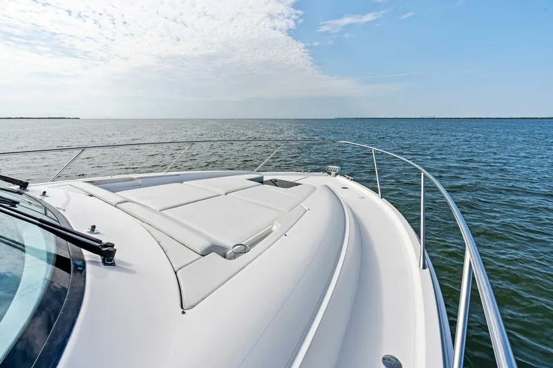 Victory Yacht Photos Pics 2019 Tiara Yachts 49 COUPE bow view on open water.