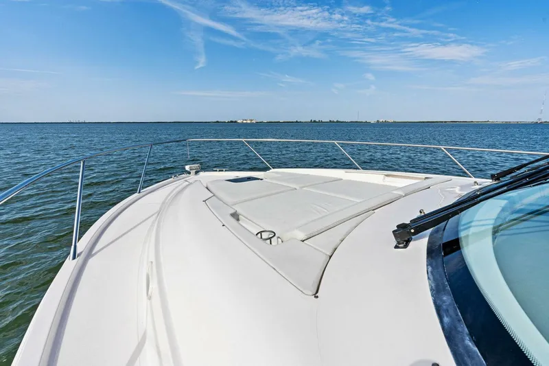 Victory Yacht Photos Pics 2019 Tiara Yachts 49 COUPE bow view on open water.