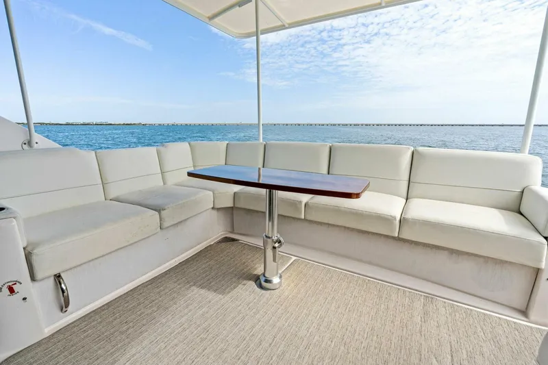 Victory Yacht Photos Pics Spacious seating area on 2019 Tiara Yachts 49 COUPE with ocean view.