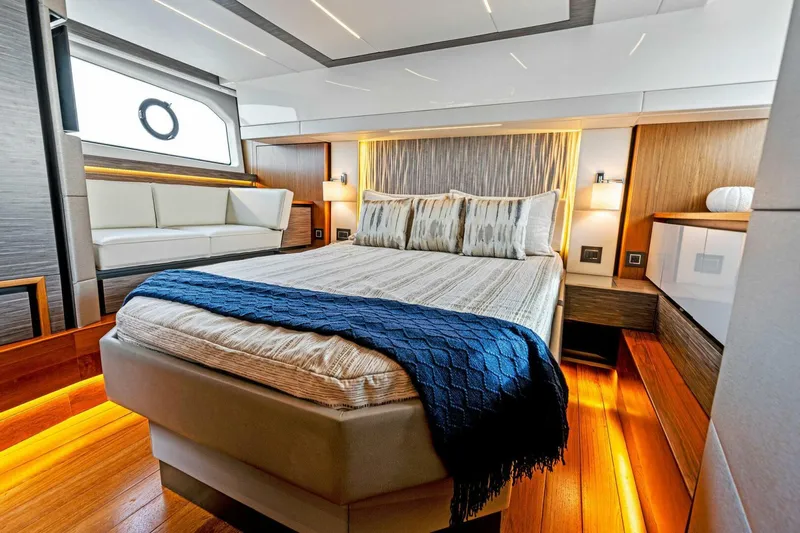 Victory Yacht Photos Pics Luxurious bedroom interior of 2019 Tiara Yachts 49 COUPE with modern design and ambient lighting.