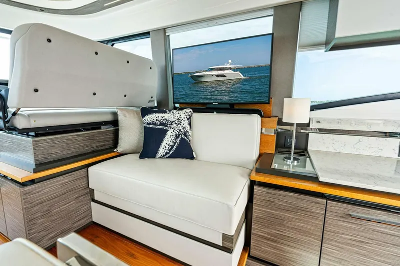 Victory Yacht Photos Pics Interior of 2019 Tiara Yachts 49 COUPE with modern seating and ocean view.
