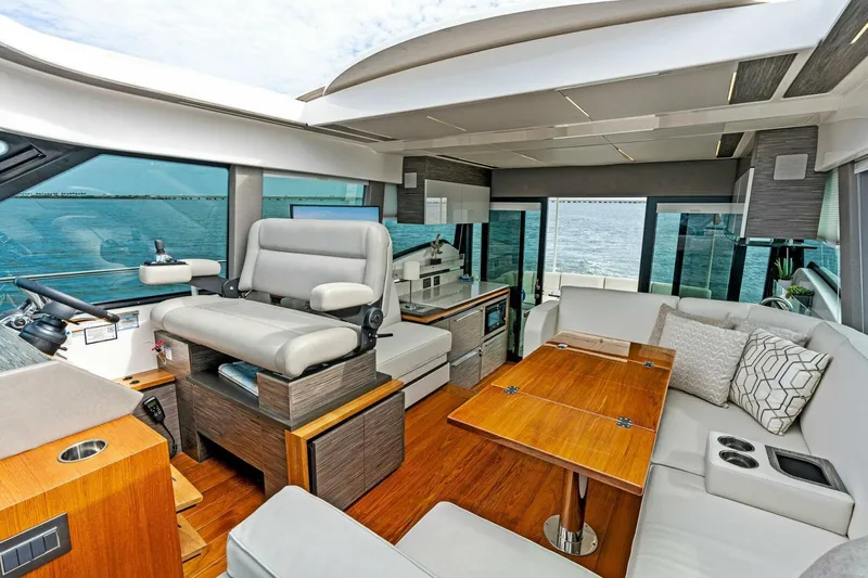 Victory Yacht Photos Pics Interior of 2019 Tiara Yachts 49 COUPE with luxurious seating and ocean view.