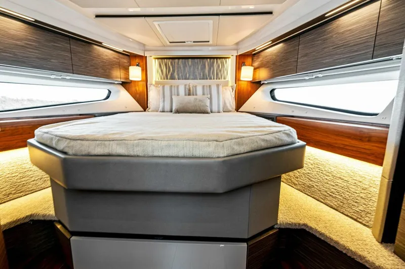 Victory Yacht Photos Pics Luxurious bedroom interior of 2019 Tiara Yachts 49 COUPE with modern lighting.