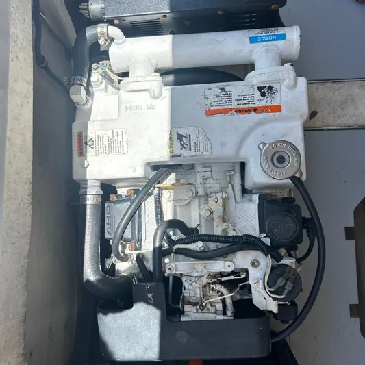  Yacht Photos Pics Engine of a 2005 Formula 330 SS boat, detailed view.