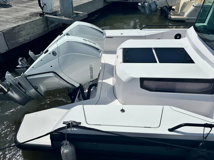 Rachel's Glory Yacht Photos Pics 2022 Axopar 37 XC Cross Cabin BRABUS LINE with twin outboard engines docked.
