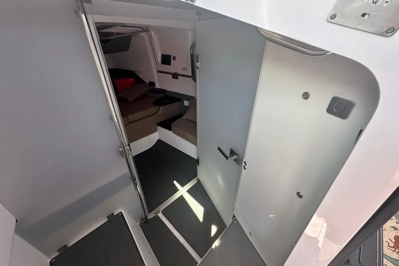 Rachel's Glory Yacht Photos Pics Interior view of 2022 Axopar 37 XC CROSS CABIN, featuring modern cabin design.