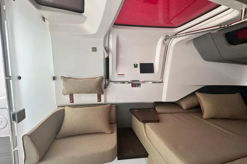 Rachel's Glory Yacht Photos Pics Interior of 2022 Axopar 37 XC CROSS CABIN with cozy seating and modern design.