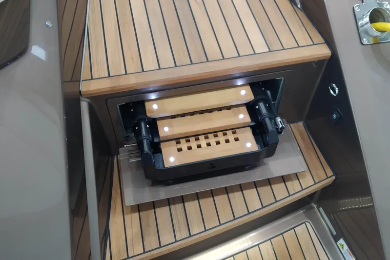  Yacht Photos Pics 2023 Cranchi 60 ST yacht interior with wooden steps and modern design.