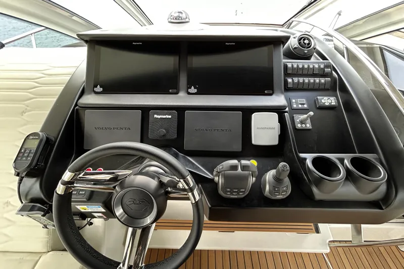  Yacht Photos Pics Helm of 2023 Cranchi 60 ST yacht with advanced navigation controls and displays.