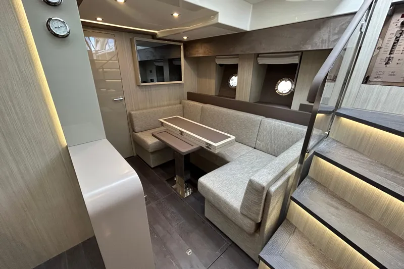  Yacht Photos Pics Luxurious interior of 2023 Cranchi 60 ST yacht with modern seating and elegant design.