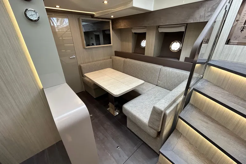  Yacht Photos Pics Luxurious interior of 2023 Cranchi 60 ST yacht with modern seating and elegant design.