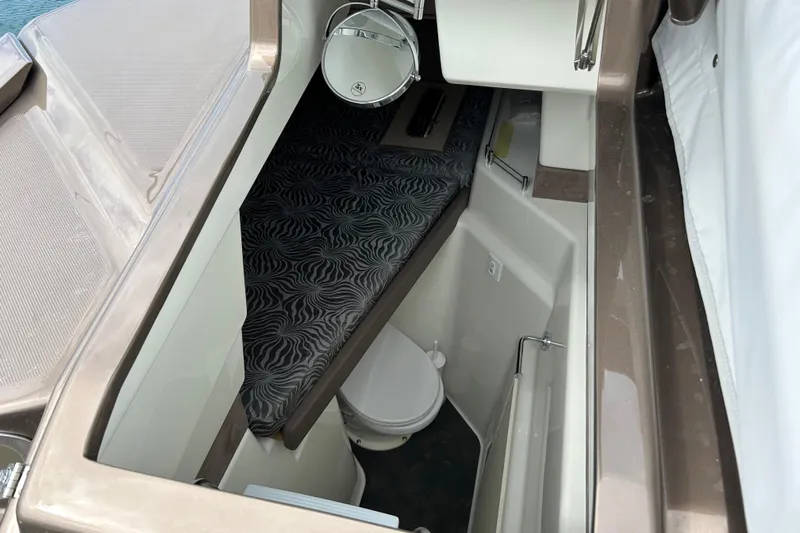  Yacht Photos Pics 2023 Cranchi 60 ST yacht interior with modern bathroom and stylish flooring.