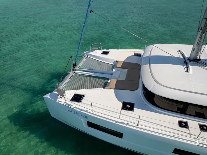 Watercolor Yacht Photos Pics 2023 Lagoon 46 catamaran sailing on clear turquoise waters.