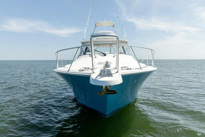 Miss Peggy Sue II Yacht Photos Pics 2018 Viking 44 Open yacht on calm ocean waters, front view.