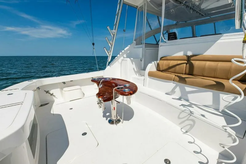 Miss Peggy Sue II Yacht Photos Pics 2018 Viking 44 Open yacht deck with seating and ocean view.