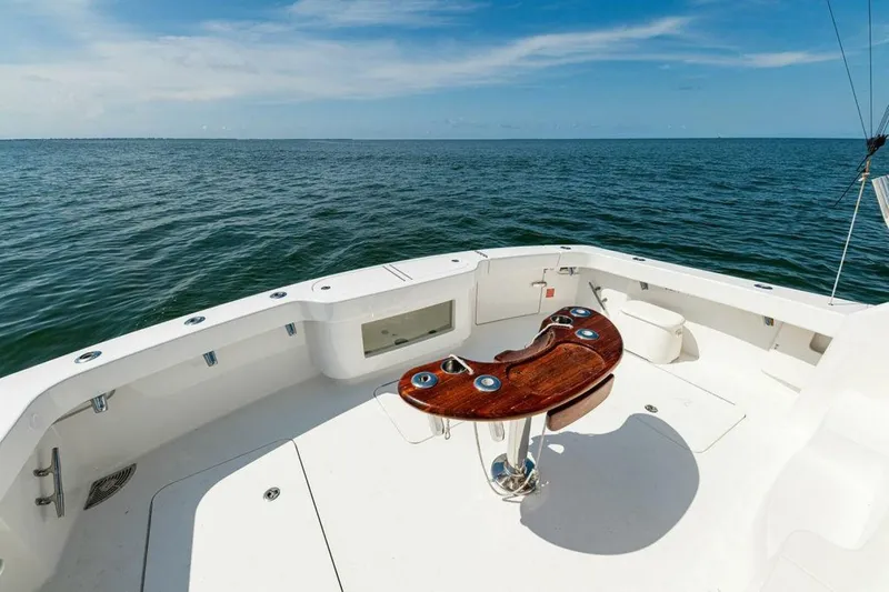 Miss Peggy Sue II Yacht Photos Pics 2018 Viking 44 Open yacht deck with ocean view and fishing chair.