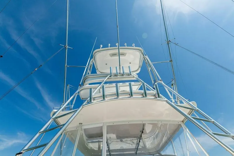 Miss Peggy Sue II Yacht Photos Pics 2018 Viking 44 Open yacht tower against a clear blue sky.