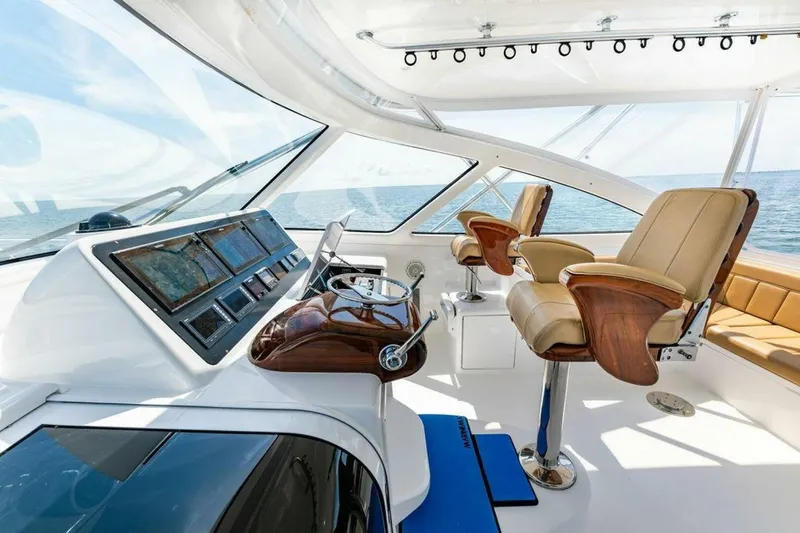 Miss Peggy Sue II Yacht Photos Pics 2018 Viking 44 Open yacht helm with luxurious seating and advanced navigation controls.