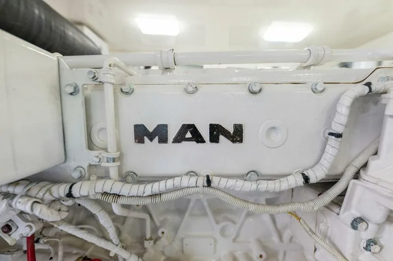 Miss Peggy Sue II Yacht Photos Pics Engine compartment of 2018 Viking 44 Open yacht featuring MAN components.