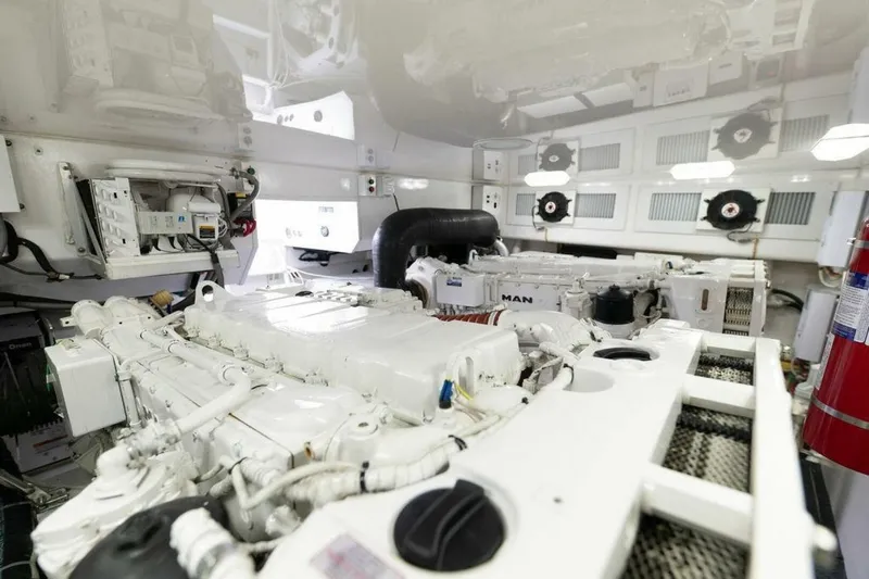 Miss Peggy Sue II Yacht Photos Pics Engine room of 2018 Viking 44 Open yacht, featuring advanced machinery and equipment.