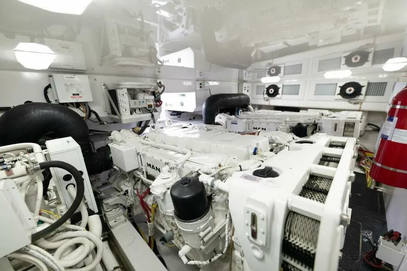 Miss Peggy Sue II Yacht Photos Pics Engine room of 2018 Viking 44 Open yacht, featuring advanced machinery and equipment.