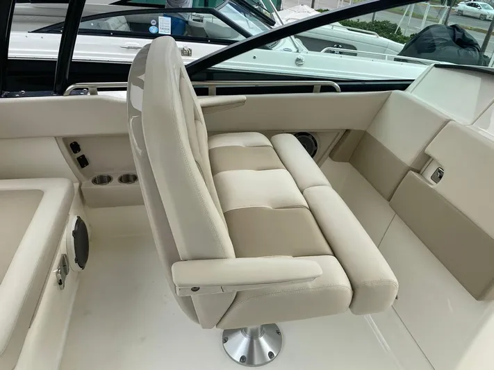 2023 Boston Whaler 320vantage @ Puerto Vallarta Yacht Photos Pics Interior of 2023 Boston Whaler 320 Vantage with beige seating.