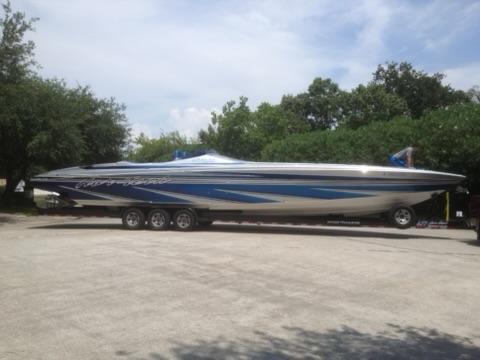 2013 Nor-Tech 477 SPX Vee Bottom boat on trailer, parked outdoors.