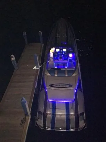  Yacht Photos Pics 2013 Nor-Tech 477 SPX Vee Bottom boat docked at night with blue LED lights.