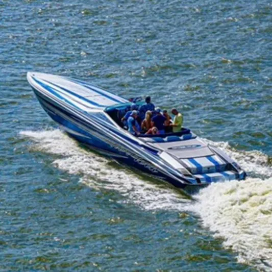  Yacht Photos Pics 2013 Nor-Tech 477 SPX Vee Bottom boat cruising on a sunny day.