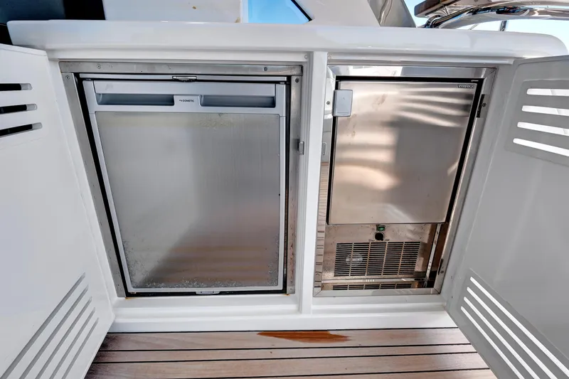 Misty K Yacht Photos Pics Built-in appliances on 2024 Sunseeker 76 Yacht, featuring sleek stainless steel design.