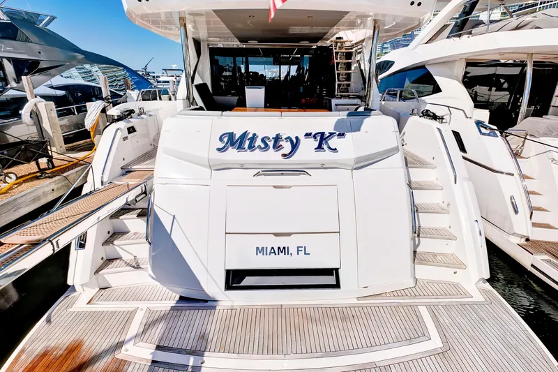 Misty K Yacht Photos Pics 2024 Sunseeker 76 Yacht docked in Miami, featuring elegant design and spacious deck.