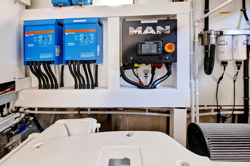 Misty K Yacht Photos Pics Engine room of 2024 Sunseeker 76 Yacht with MAN control panel and electrical systems.