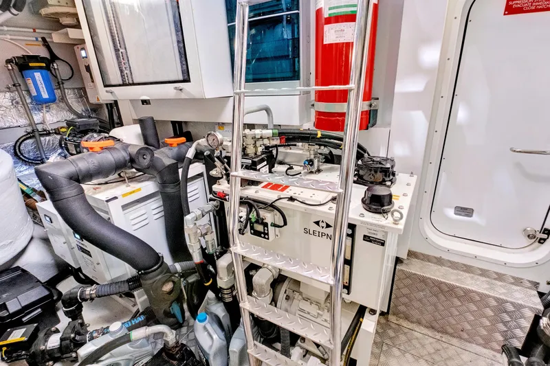 Misty K Yacht Photos Pics Engine room of 2024 Sunseeker 76 Yacht, featuring advanced machinery and equipment.