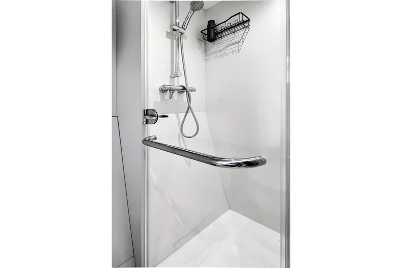 Misty K Yacht Photos Pics Shower area in 2024 Sunseeker 76 Yacht, featuring modern fixtures and sleek design.