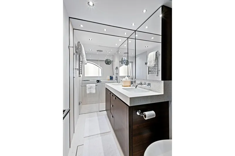 Misty K Yacht Photos Pics Luxurious bathroom in 2024 Sunseeker 76 Yacht, featuring modern fixtures and elegant design.