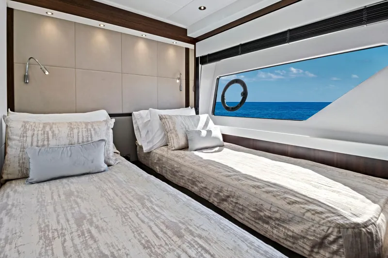 Misty K Yacht Photos Pics Luxurious twin bedroom on 2024 Sunseeker 76 Yacht with ocean view.