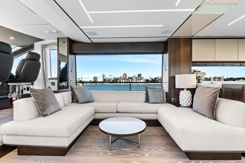 Misty K Yacht Photos Pics Luxurious interior of 2024 Sunseeker 76 Yacht with elegant seating and waterfront view.