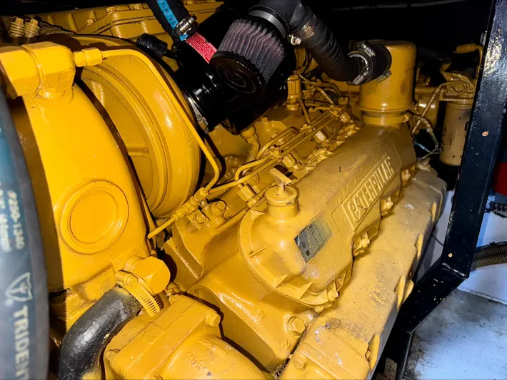 Empty Pockets Yacht Photos Pics Engine of 1997 Viking Sport Cruisers 48SC, showcasing detailed mechanical components.