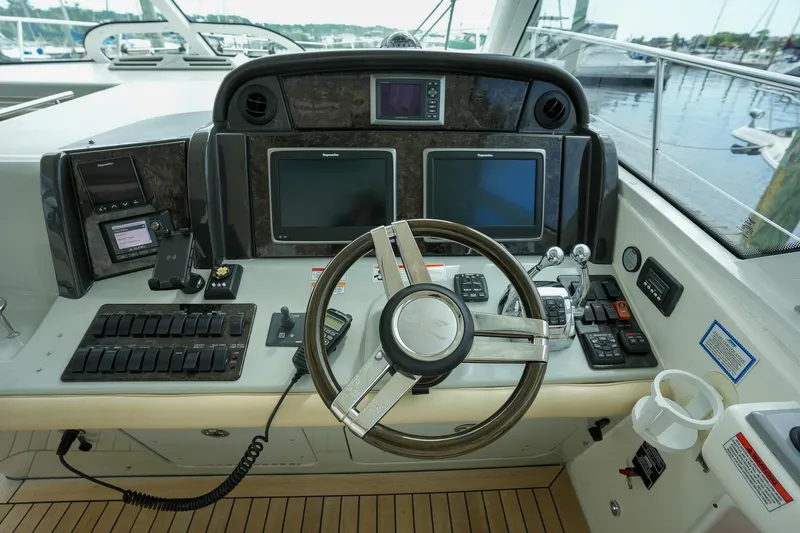  Yacht Photos Pics Helm of 2010 Sea Ray 500 Sundancer with dual displays and navigation controls.
