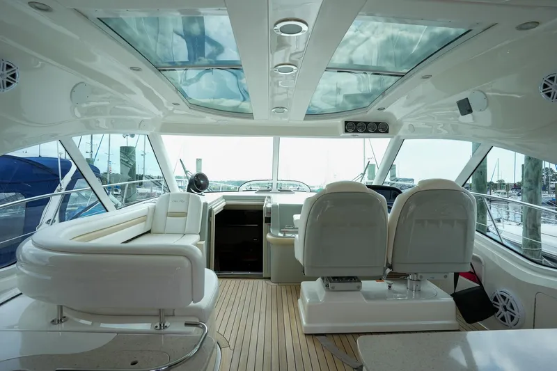  Yacht Photos Pics Interior of 2010 Sea Ray 500 Sundancer yacht with luxurious seating and panoramic windows.