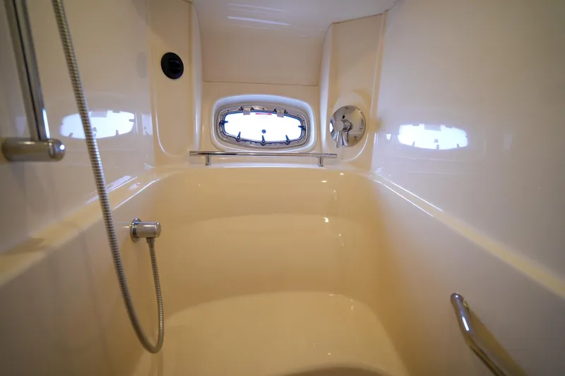  Yacht Photos Pics Shower area in 2010 Sea Ray 500 Sundancer yacht with window and chrome fixtures.