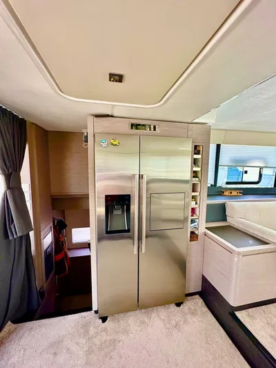  Yacht Photos Pics Modern kitchen area in 2021 Fountaine Pajot MY6 yacht with stainless steel refrigerator.