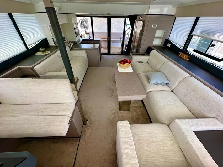  Yacht Photos Pics Luxurious interior of 2021 Fountaine Pajot MY6 yacht with modern furnishings and spacious seating.