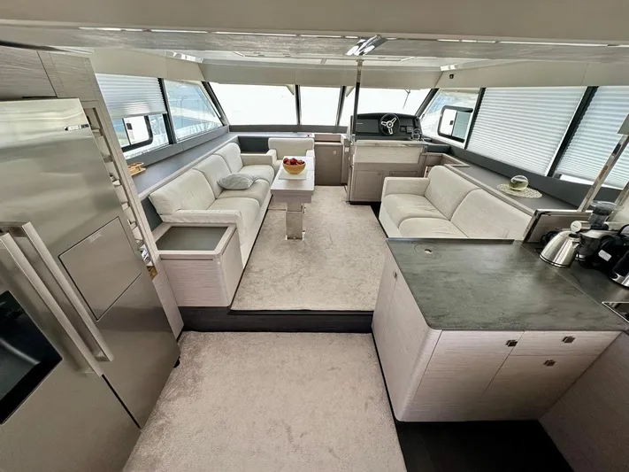  Yacht Photos Pics Luxurious interior of 2021 Fountaine Pajot MY6 yacht with modern kitchen and seating area.