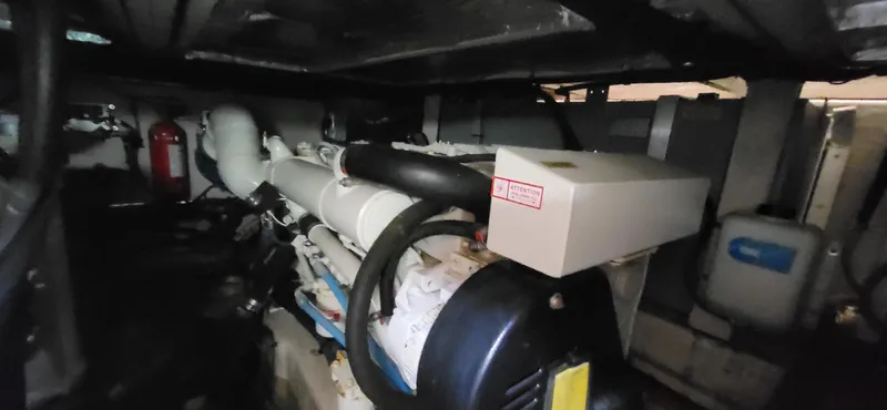  Yacht Photos Pics Engine room of 2005 Sea Ray 390 Motor Yacht, showcasing mechanical components and equipment.