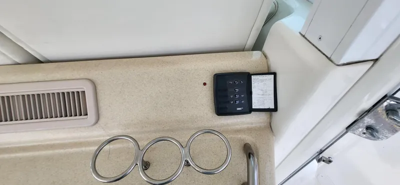  Yacht Photos Pics Control panel and cup holders on 2005 Sea Ray 390 Motor Yacht interior.