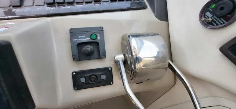  Yacht Photos Pics Control panel of a 2005 Sea Ray 390 Motor Yacht with bow thruster and throttle.