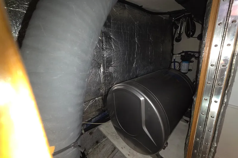  Yacht Photos Pics Engine compartment of a 2007 Catalina 42 MkII sailboat, featuring a cylindrical component.